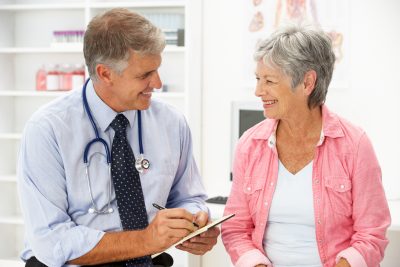 Doctor Consulting with Patient